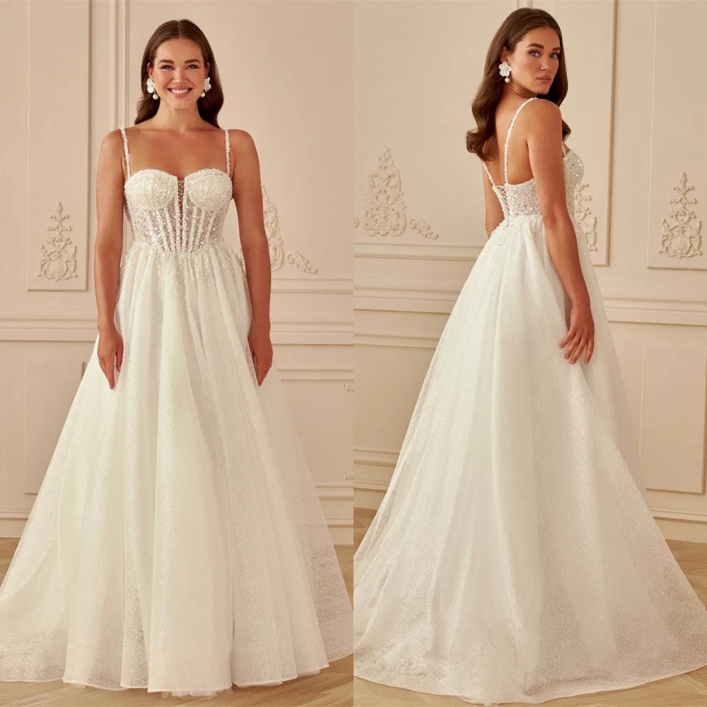 Customized Elegant Organza Sequined Wedding Dress Exquisite Strapless Spaghetti Straps Sleeveless Chapel Train Bridal Gowns
Customized Elegant Organza Sequined Wedding Dress Exquisite Strapless Spaghetti Straps Sleeveless Chapel Train Bridal Gowns