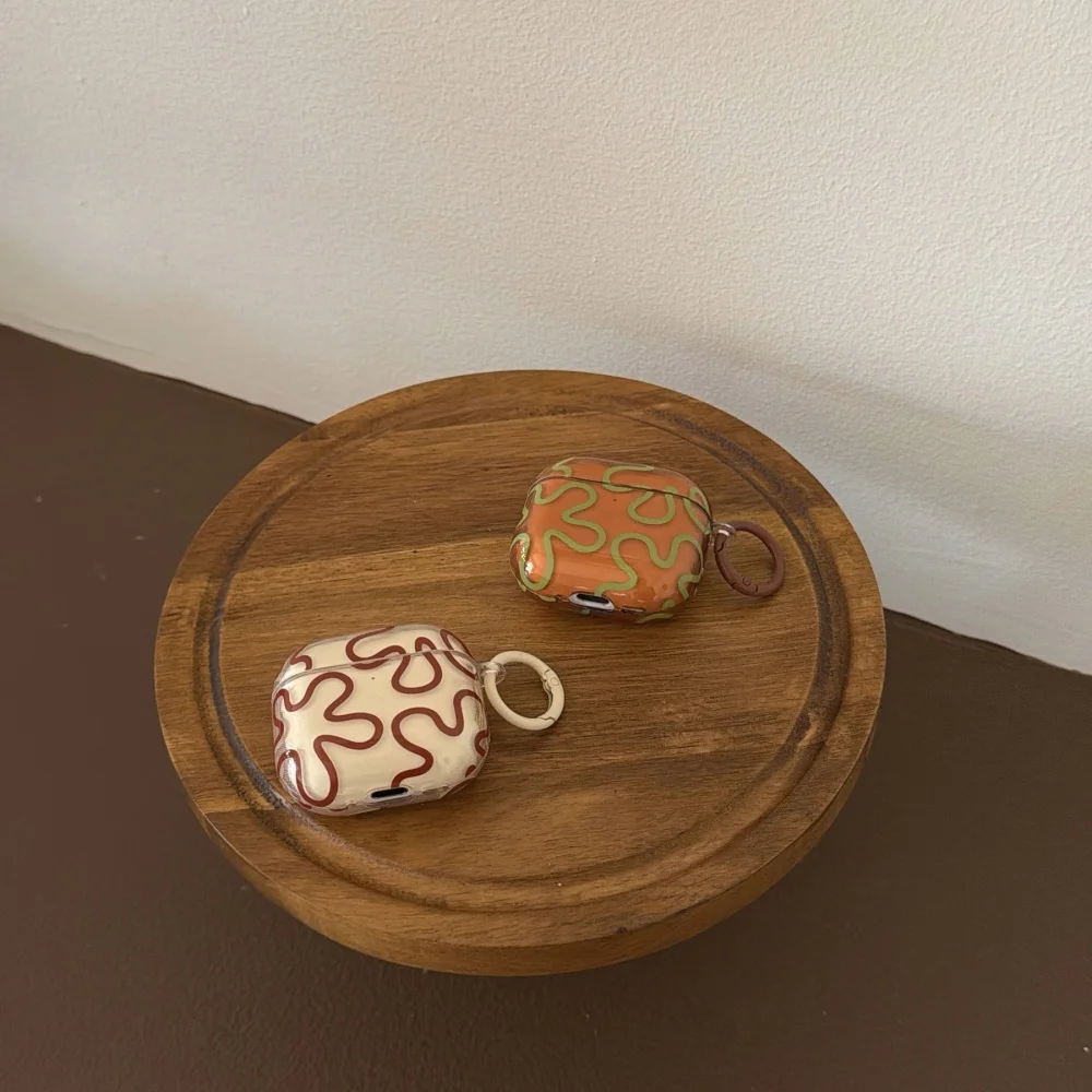 Simple style geometric brown and green line headphone protective case,suitable for AirPods4/3/2Pro/2/4,INS style protective case
Simple style geometric brown and green line headphone protective case,suitable for AirPods4/3/2Pro/2/4,INS style protective case