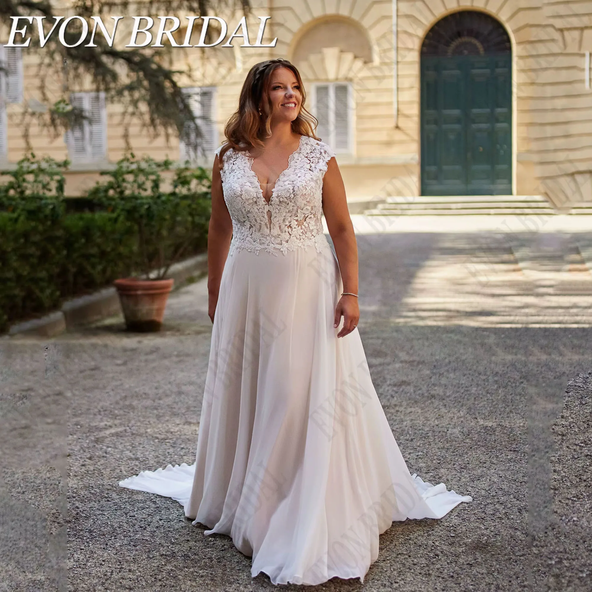 V-Neck Plus Size Wedding Dress Bride Cap Sleeves Beading Chiffon A-Line Bride Gown Applique Illusion Back EVON BRIDAL Customized
V-Neck Plus Size Wedding Dress Bride Cap Sleeves Beading Chiffon A-Line Bride Gown Applique Illusion Back EVON BRIDAL Customized