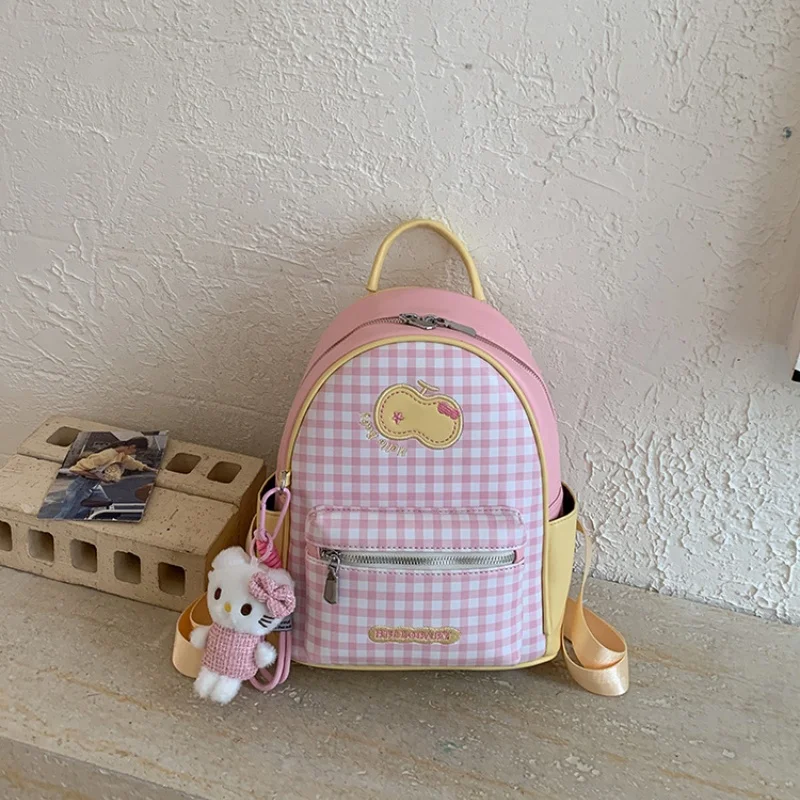 Cute gingham mini backpack with embroidery & plush charm, adjustable straps for everyday use
Cute gingham mini backpack with embroidery & plush charm, adjustable straps for everyday use