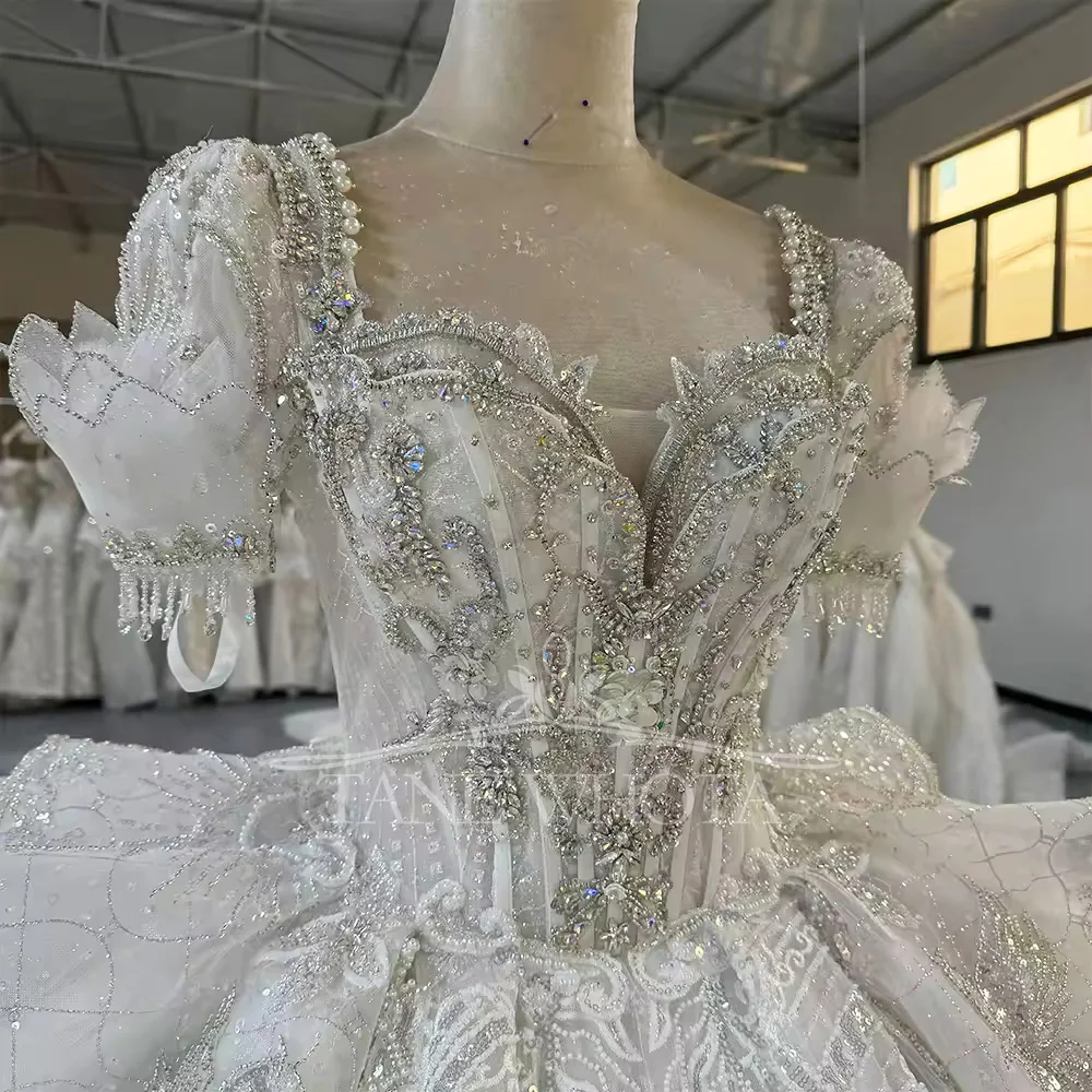 Vestido De Novia Гражданское бальное платье с короткими рукавами и кристаллами в форме сердца, свадебное платье, роскошное свадебное платье с замочной скважиной сзади
Vestido De Novia Гражданское бальное платье с короткими рукавами и кристаллами в форме сердца, свадебное платье, роскошное свадебное платье с замочной скважиной сзади