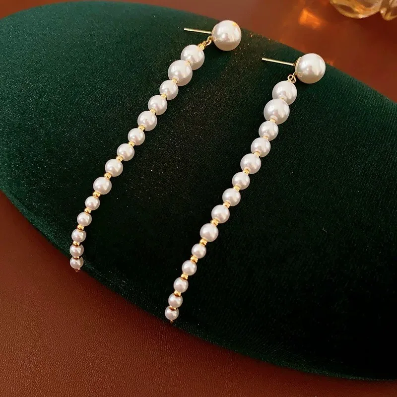 Luxury Long Pearl Drop Earrings for Women – Elegant Graduated Faux Pearls with Gold Accents
Luxury Long Pearl Drop Earrings for Women – Elegant Graduated Faux Pearls with Gold Accents