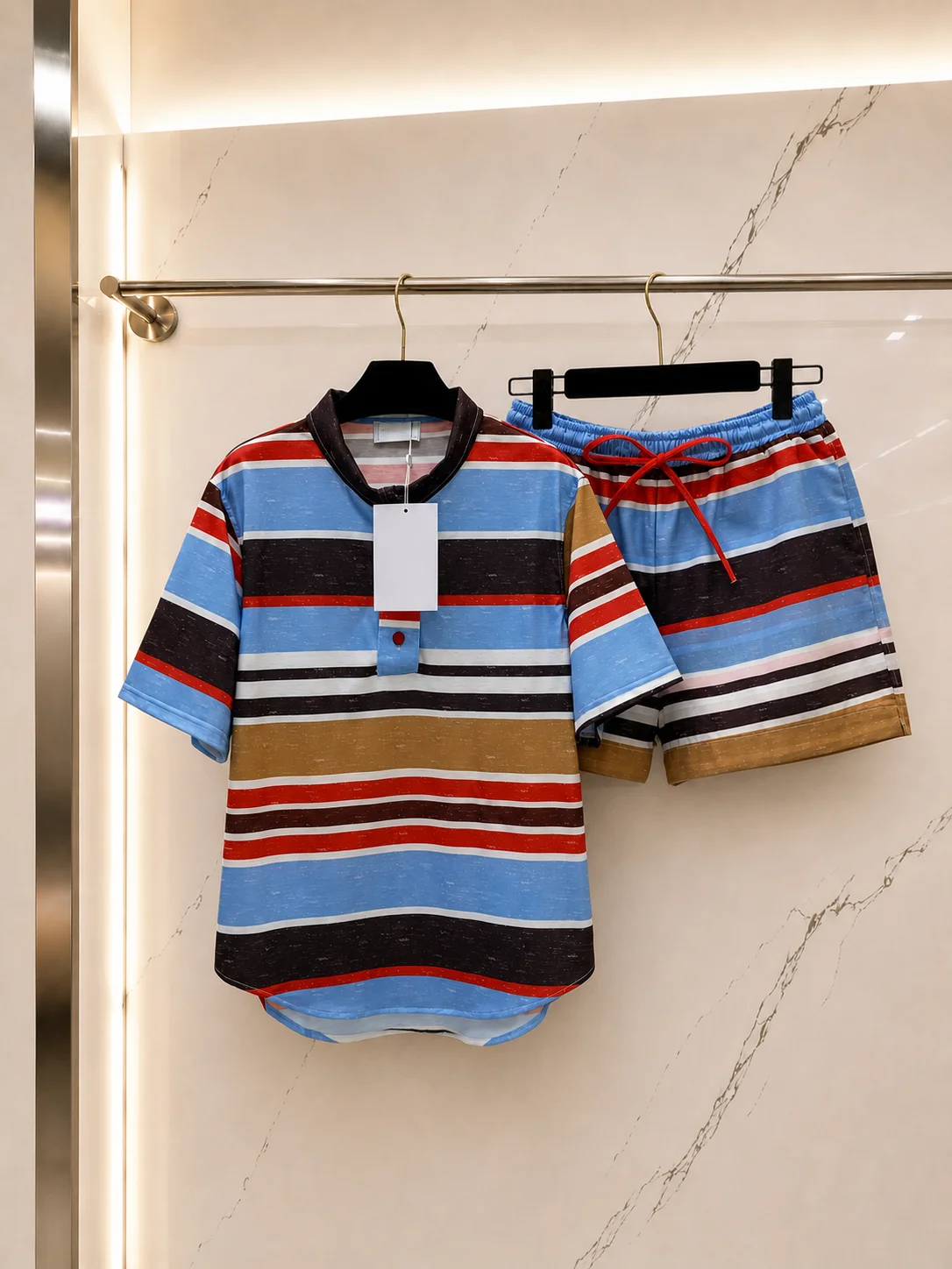 2026 Women Two Piece Set Multi Tone Stripe Stand Collar Half Placket Short Sleeve Drawstring Lightweight Summer Shorts
2026 Women Two Piece Set Multi Tone Stripe Stand Collar Half Placket Short Sleeve Drawstring Lightweight Summer Shorts