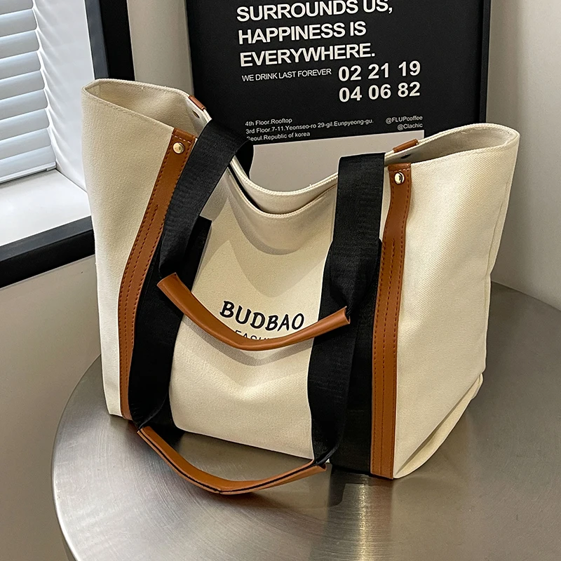 Large Canvas Shoulder Tote Bag for Women Fashionable and Practical Casual Daily Bag with Wide Straps Perfect for Shopping Work
Large Canvas Shoulder Tote Bag for Women Fashionable and Practical Casual Daily Bag with Wide Straps Perfect for Shopping Work
