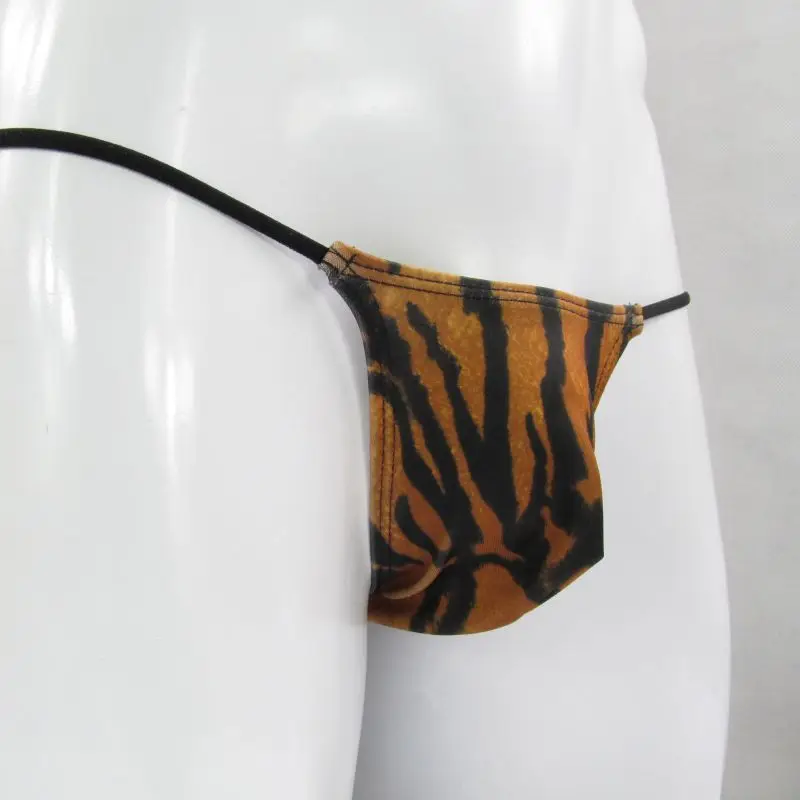 Мужские стринги G2084 с принтом в виде звезд и полосок, сексуальные, с небольшим вырезом, из ткани для купальников, с минимальным покрытием.
Мужские стринги G2084 с принтом в виде звезд и полосок, сексуальные, с небольшим вырезом, из ткани для купальников, с минимальным покрытием.