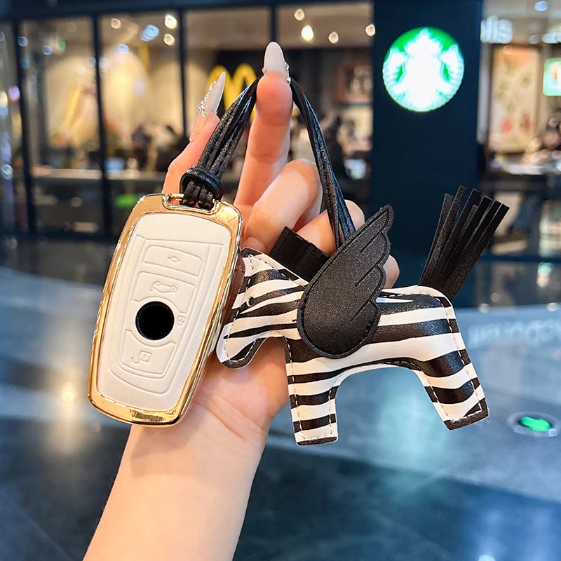 Suitable for BMW series car key bag car key chain car key bag decoration puppy decoration cars accessories car key accessories
Suitable for BMW series car key bag car key chain car key bag decoration puppy decoration cars accessories car key accessories