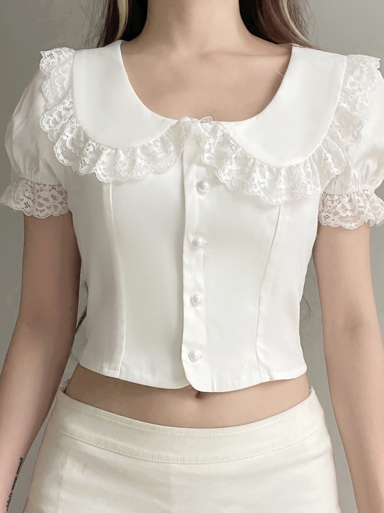 Rockmoer White Peter pan Collar Women’s Blouse Lace Pearls Buttons Cropped Shirts Elegant Summer Kawaii Short Sleeve Casual Tops
Rockmoer White Peter pan Collar Women’s Blouse Lace Pearls Buttons Cropped Shirts Elegant Summer Kawaii Short Sleeve Casual Tops