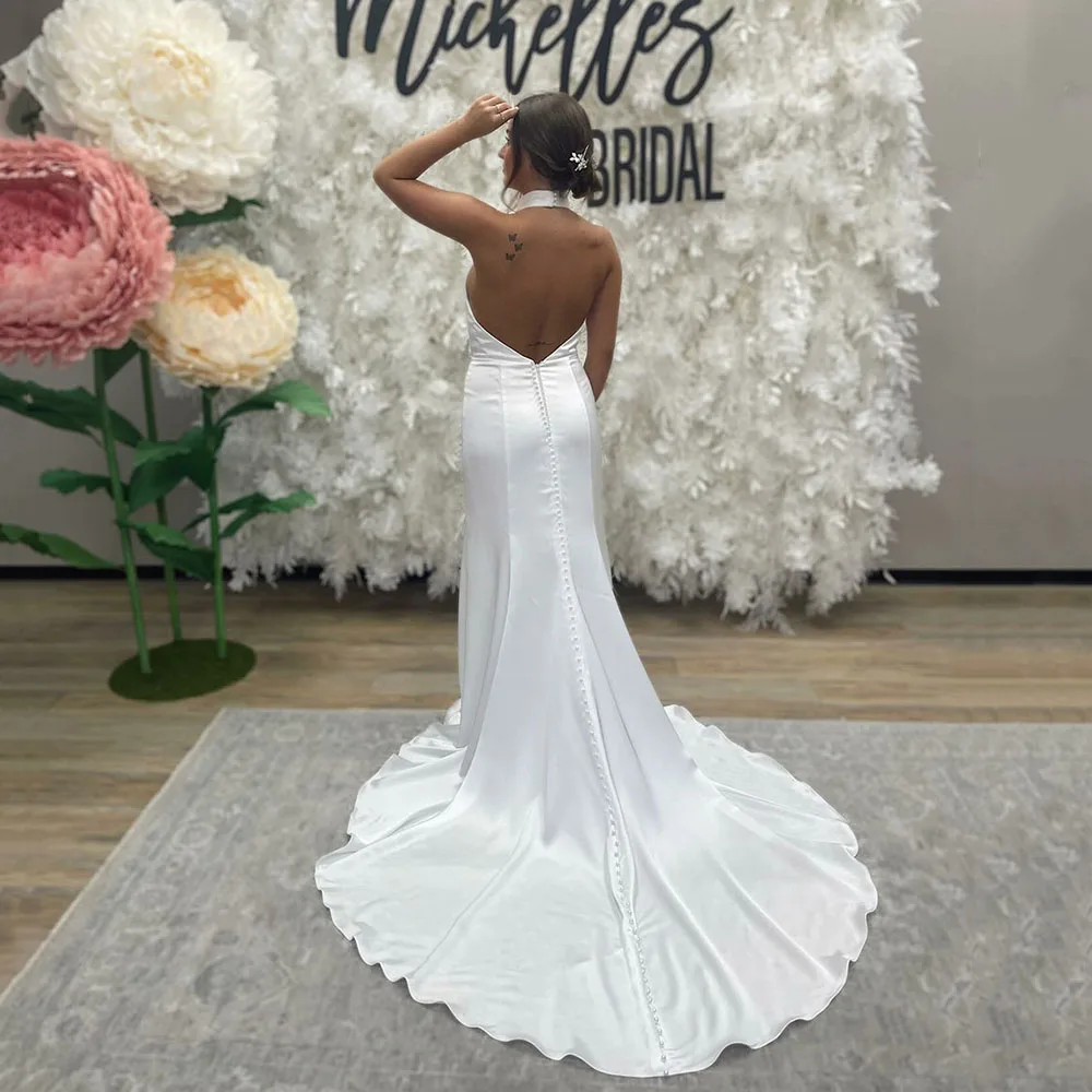 White Wedding Dresses Sleeveless Halter Backless Elegant Wedding Party Dress Bride Dress Mermaid Button Bridal Gown
White Wedding Dresses Sleeveless Halter Backless Elegant Wedding Party Dress Bride Dress Mermaid Button Bridal Gown