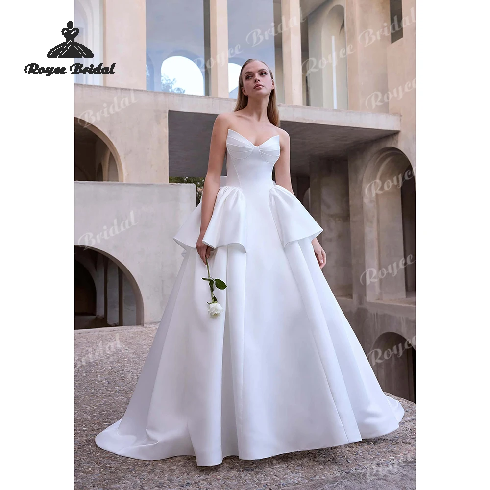 Ruched Stain Bow A Line Wedding Dresses 2026 Strapless Sweetheart Bodice Beach Bridal Gowns Custom vestido de novia
Ruched Stain Bow A Line Wedding Dresses 2026 Strapless Sweetheart Bodice Beach Bridal Gowns Custom vestido de novia