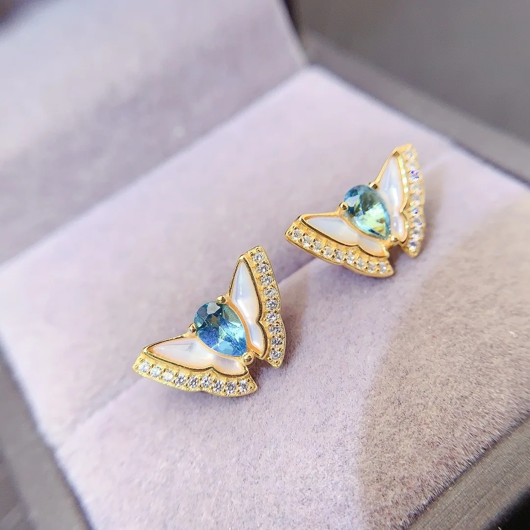 fine Jewelry Women's Earrings 925 Sterling Silver Inset with Natural Swiss Blue Topar 5x7mm Plated 18K Gold Butterfly Fritillion
fine Jewelry Women's Earrings 925 Sterling Silver Inset with Natural Swiss Blue Topar 5x7mm Plated 18K Gold Butterfly Fritillion