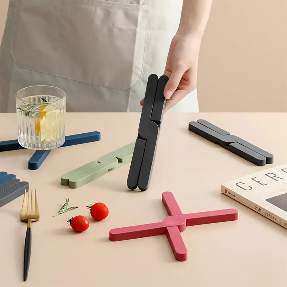 Silicone X Shaped Heat Resistant Pad Foldable Non-Slip Pot Pan Mat Table Placemat Dish Plate Cross Holder Coaster Kitchen
Silicone X Shaped Heat Resistant Pad Foldable Non-Slip Pot Pan Mat Table Placemat Dish Plate Cross Holder Coaster Kitchen