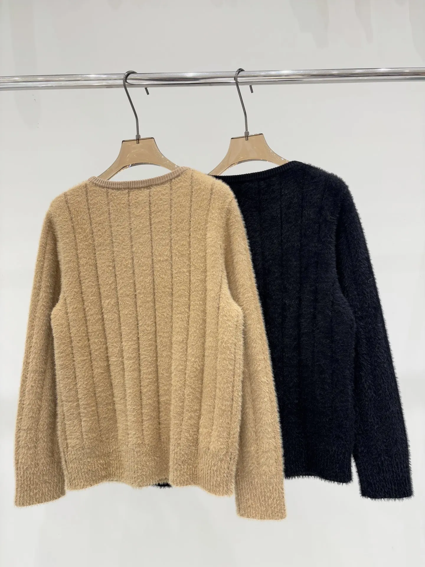 25 Autumn/Winter New Women's Fashion Round Neck Knitted Loose Long Sleeve Button Pocket Temperament cardigan Coat
25 Autumn/Winter New Women's Fashion Round Neck Knitted Loose Long Sleeve Button Pocket Temperament cardigan Coat