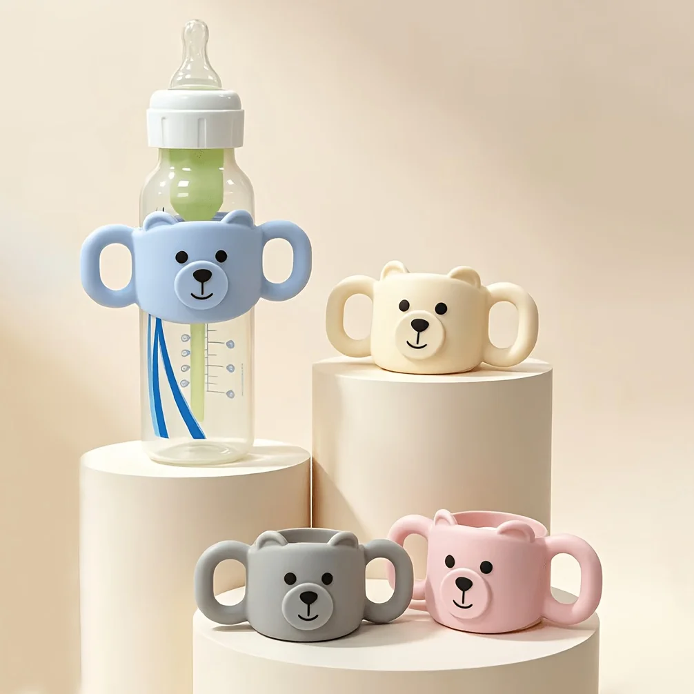 Standard-sized silicone bottle protector, featuring a cute teddy bear bottle handle. Durable and robust.
Standard-sized silicone bottle protector, featuring a cute teddy bear bottle handle. Durable and robust.