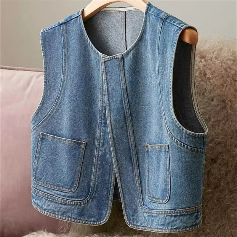 Vintage Denim Vest Women New Round Neck Loose Fit Slimming Waistcoat Fashion Sleeveless Top Casual Versatile Outerwear Jacket
Vintage Denim Vest Women New Round Neck Loose Fit Slimming Waistcoat Fashion Sleeveless Top Casual Versatile Outerwear Jacket