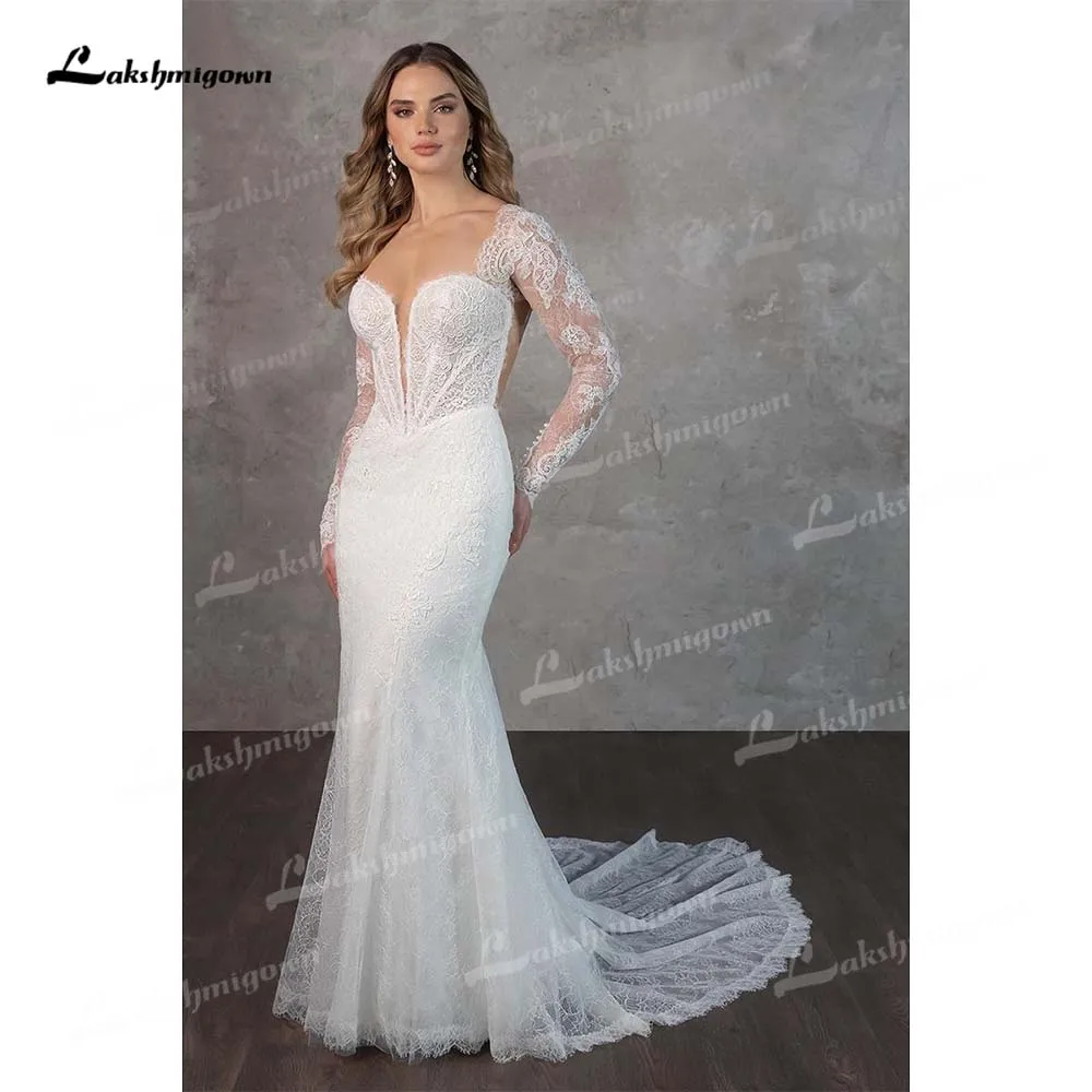 Lakshmigown Изысканное кружевное свадебное платье русалки с длинными рукавами 2026 Свадебное платье с v-образным вырезом и открытой спиной Vestidos De Novia по индивидуальному заказу
Lakshmigown Изысканное кружевное свадебное платье русалки с длинными рукавами 2026 Свадебное платье с v-образным вырезом и открытой спиной Vestidos De Novia по индивидуальному заказу