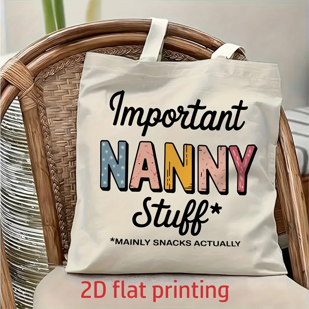 1 Piece of "Nanny's Important Stuff" Canvas Shoulder Bag, Which Is Actually Mainly for Snacks, Is a Fun Canvas Shoulder Bag, Lightweight Foldable Tote Bag, with Fixed Shoulder Strap, Reusable Shopping Bag, Perfect for Commuting, Traveling, Shopping, Schoo
1 Piece of "Nanny's Important Stuff" Canvas Shoulder Bag, Which Is Actually Mainly for Snacks, Is a Fun Canvas Shoulder Bag, Lightweight Foldable Tote Bag, with Fixed Shoulder Strap, Reusable Shopping Bag, Perfect for Commuting, Traveling, Shopping, Schoo