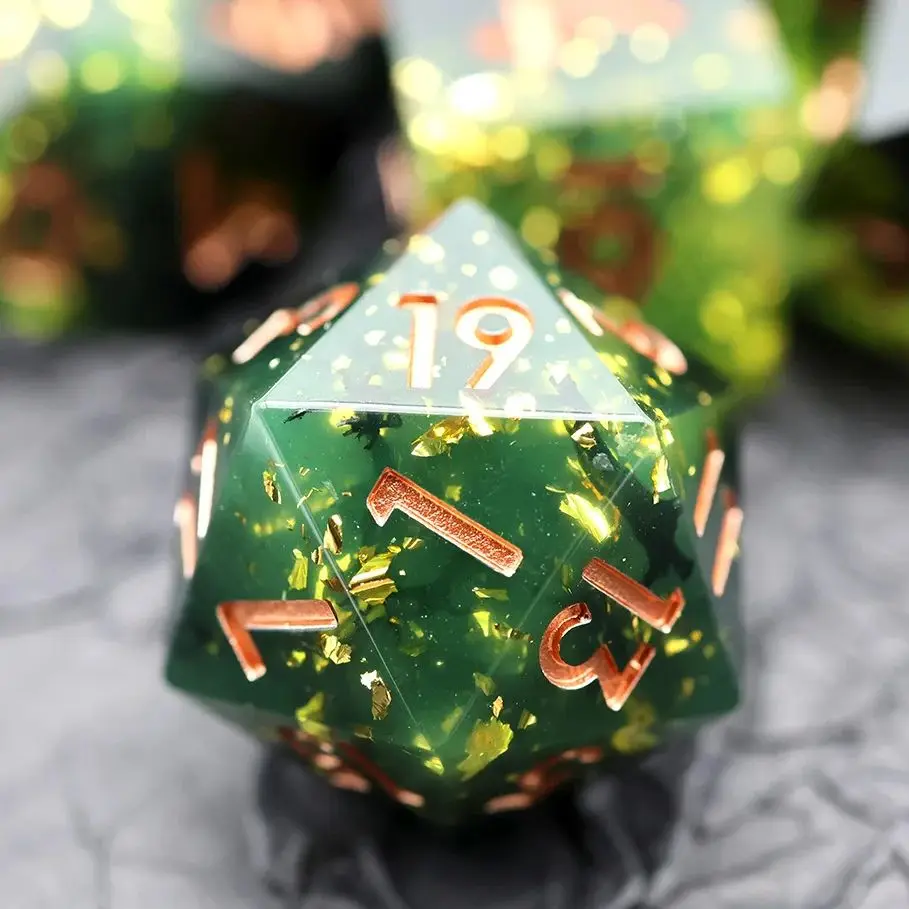 Handcrafted Artisan Resin DND Dice Set, Green Core with Shimmering Gold Paper, Translucent Pulp Texture RPG Dice - N7
Handcrafted Artisan Resin DND Dice Set, Green Core with Shimmering Gold Paper, Translucent Pulp Texture RPG Dice - N7