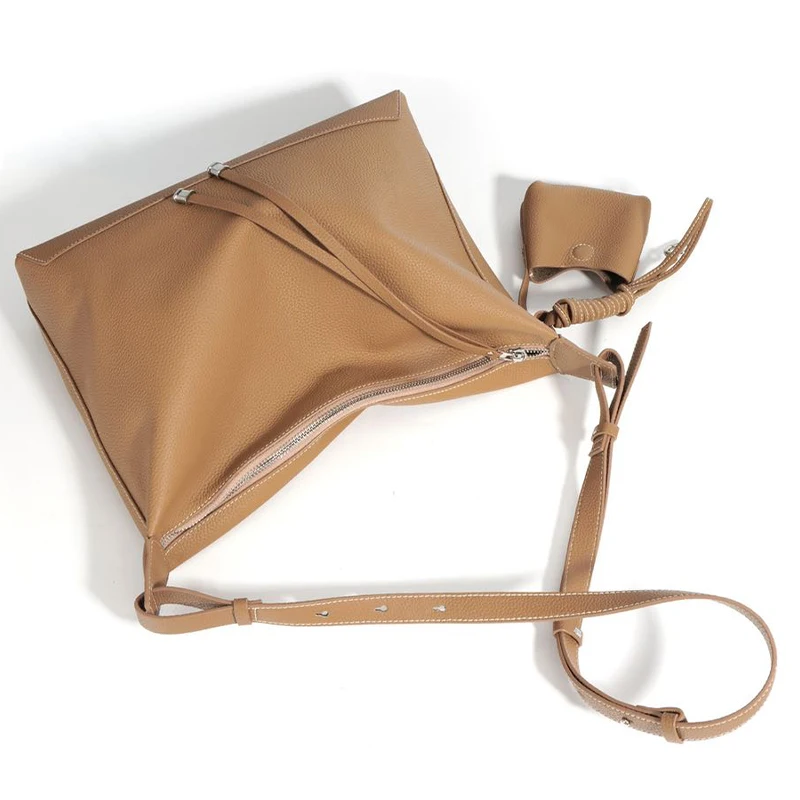 Gorfia new niche simple large capacity commuter tote bag genuine leather high-end feel fashion underarm bag handbag
Gorfia new niche simple large capacity commuter tote bag genuine leather high-end feel fashion underarm bag handbag