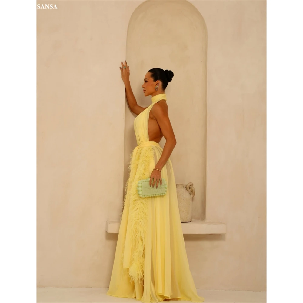 Sansa индивидуальное желтое иллюзионное платье с бретелькой на шее и открытой спиной для выпускного вечера с перьями и складками Vestidos De Noche длиной до пола, торжественное вечернее платье
Sansa индивидуальное желтое иллюзионное платье с бретелькой на шее и открытой спиной для выпускного вечера с перьями и складками Vestidos De Noche длиной до пола, торжественное вечернее платье