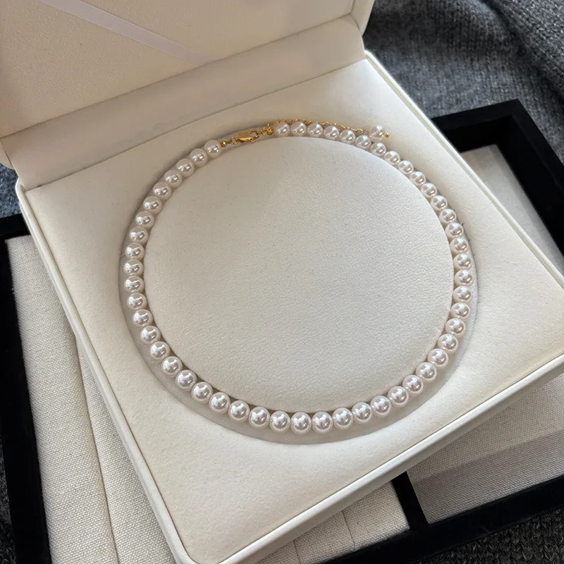 Classic Faux Pearl Choker Necklace for Women – Elegant Beaded Collar with Gold Clasp
Classic Faux Pearl Choker Necklace for Women – Elegant Beaded Collar with Gold Clasp
