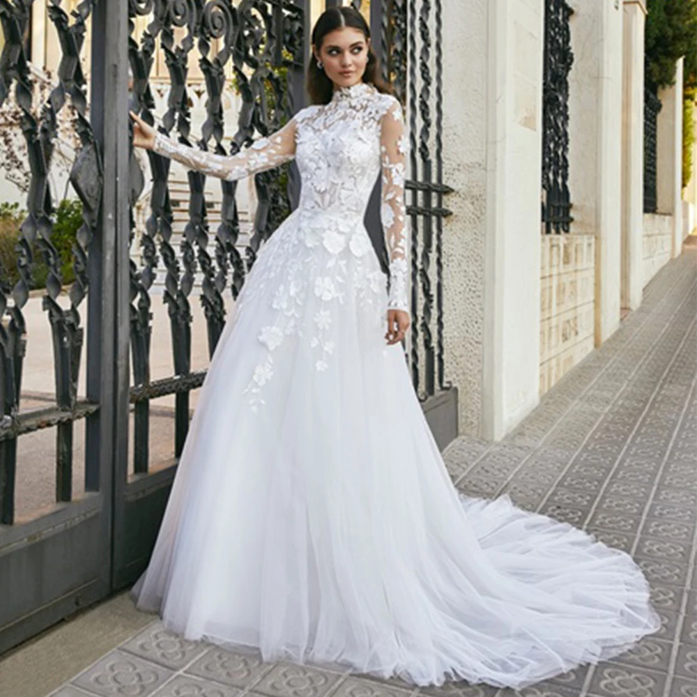 High Neck Long Sleeve Applique Wedding Dress Illusion Tulle A-Line Floor Length Bridal Sweep Train Luxury Customized Gown
High Neck Long Sleeve Applique Wedding Dress Illusion Tulle A-Line Floor Length Bridal Sweep Train Luxury Customized Gown