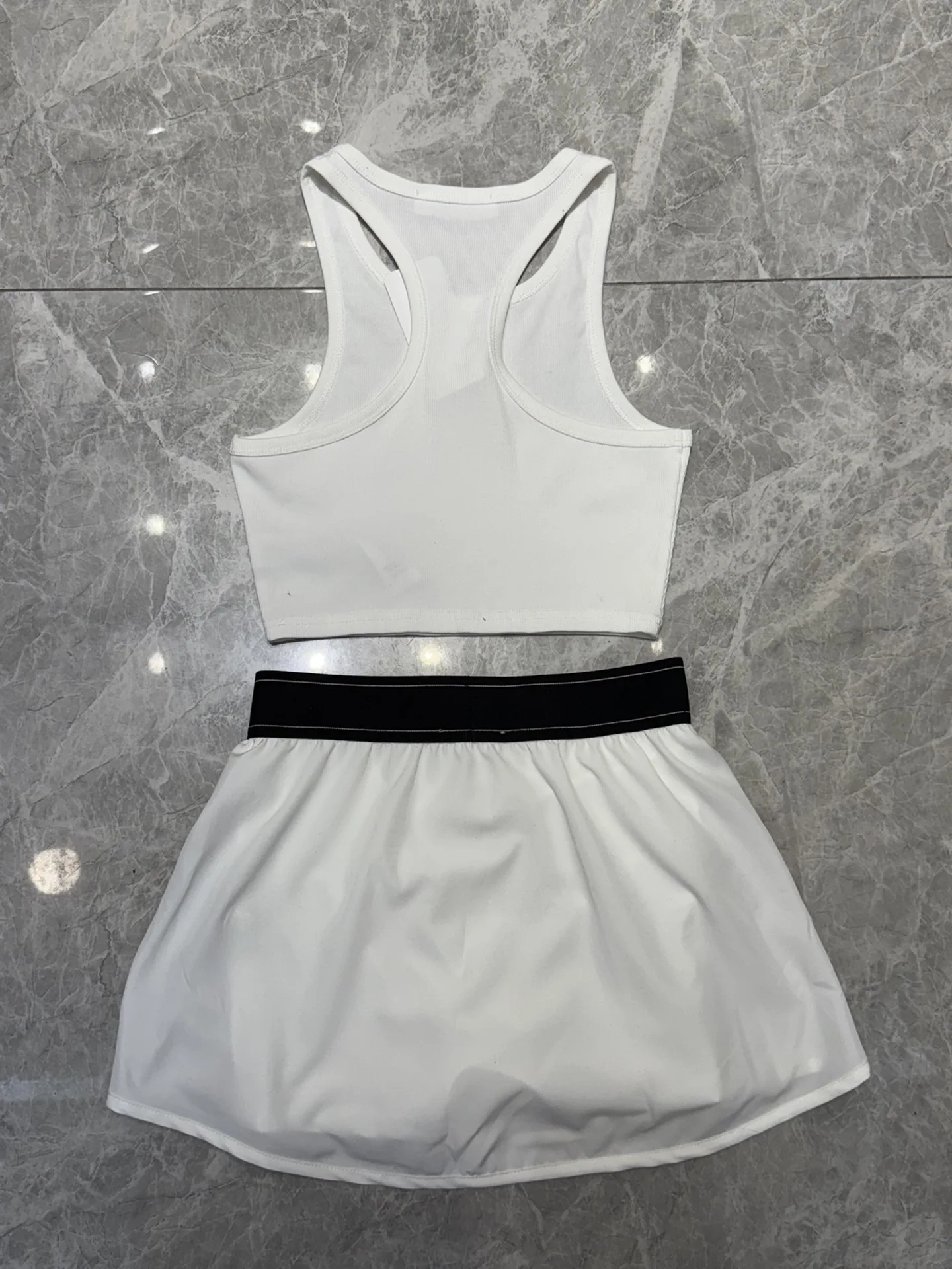 Women's new sports vest+short skirt tennis sportswear yoga clothing running suit set
Women's new sports vest+short skirt tennis sportswear yoga clothing running suit set