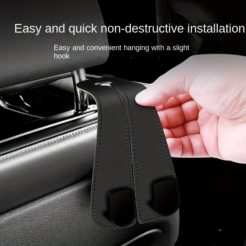 A car headrest hook, used for hanging bags, is specifically designed for organizing and securing items on the back of the seat
A car headrest hook, used for hanging bags, is specifically designed for organizing and securing items on the back of the seat