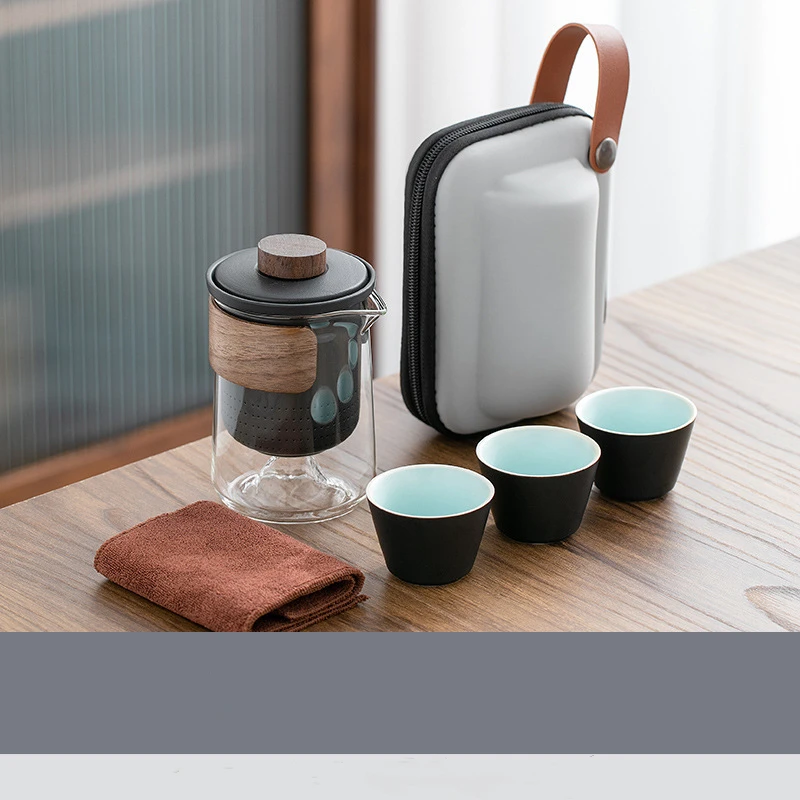 4pcs Camping Cup Travel Tea Set Kung Fu Tea Set Glass 1 Pot 3 Ceramic Cup Outdoor Teapot Small Set Cup Set
4pcs Camping Cup Travel Tea Set Kung Fu Tea Set Glass 1 Pot 3 Ceramic Cup Outdoor Teapot Small Set Cup Set