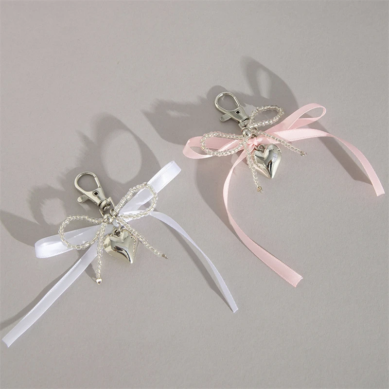 2pcs/set Bowknot Ribbon Bag Pendant Geometric Heart Alloy Pendant Keychain for Women Girls Girlfriend Jewelry Gift
2pcs/set Bowknot Ribbon Bag Pendant Geometric Heart Alloy Pendant Keychain for Women Girls Girlfriend Jewelry Gift