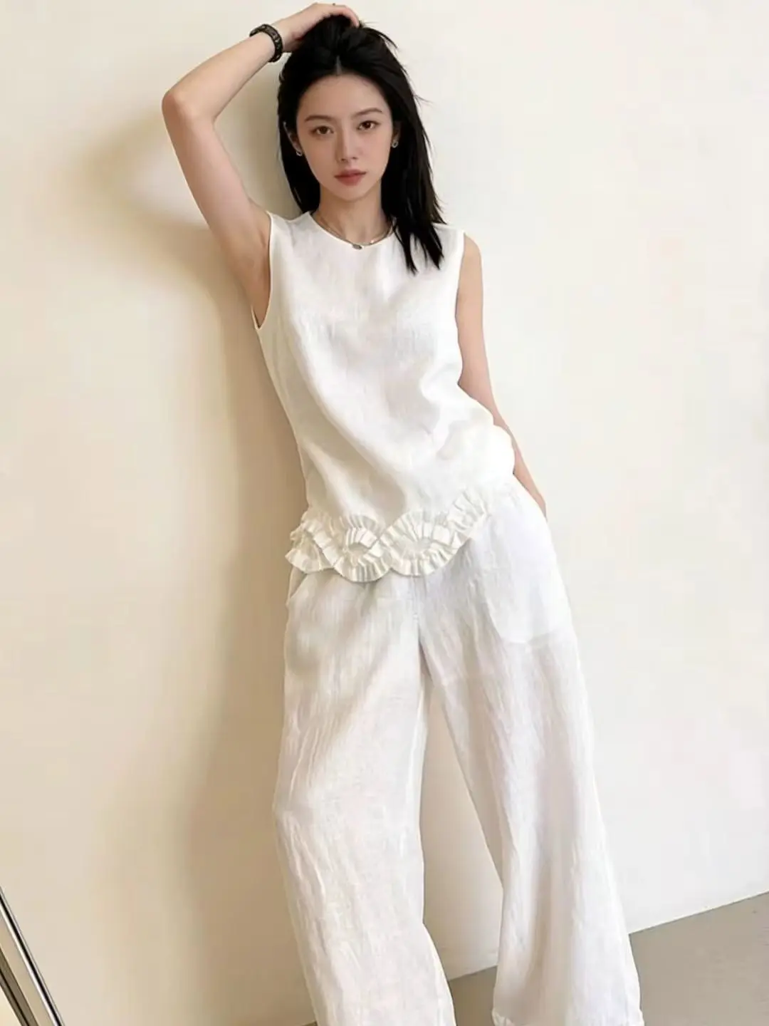 Elegant summer linen lace round neck vest and lace trimmed wide leg trouser set
Elegant summer linen lace round neck vest and lace trimmed wide leg trouser set