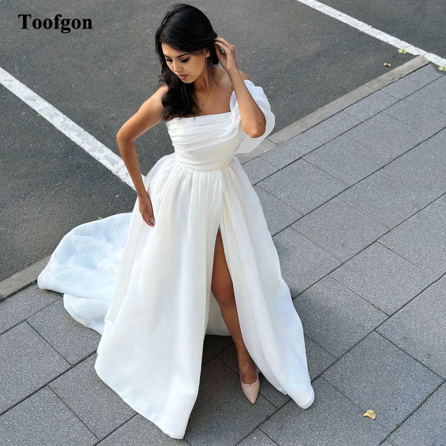 Toofan Organza Свадебные платья по индивидуальному заказу с разрезом на одно плечо и длинным шлейфом Вечерние свадебные платья с корсетом на спине Платье для фотографии невесты
Toofan Organza Свадебные платья по индивидуальному заказу с разрезом на одно плечо и длинным шлейфом Вечерние свадебные платья с корсетом на спине Платье для фотографии невесты