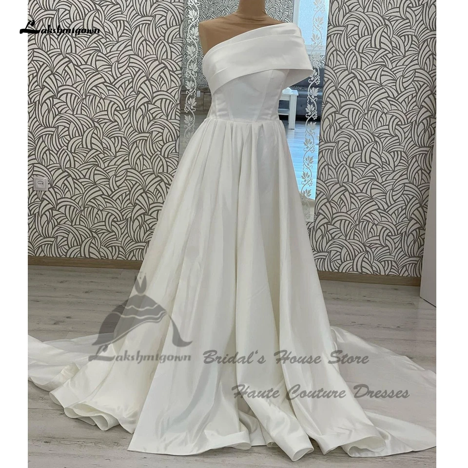 Lakshmigown элегантное атласное женское платье на одно плечо со шнуровкой сзади 2024 Vestidos Длинные свадебные халаты пляжные платья невесты на заказ
Lakshmigown элегантное атласное женское платье на одно плечо со шнуровкой сзади 2024 Vestidos Длинные свадебные халаты пляжные платья невесты на заказ