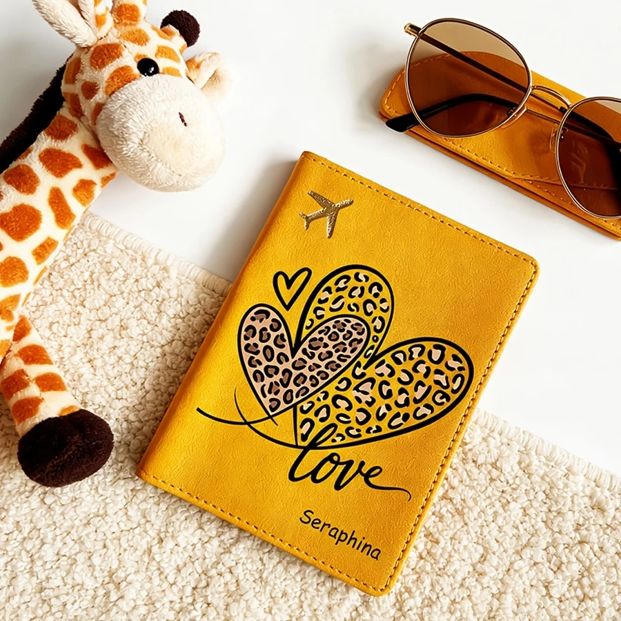 Custom name faux leather passport holder. Leopard heart print, multi-color options, practical travel wallet for women.
Custom name faux leather passport holder. Leopard heart print, multi-color options, practical travel wallet for women.