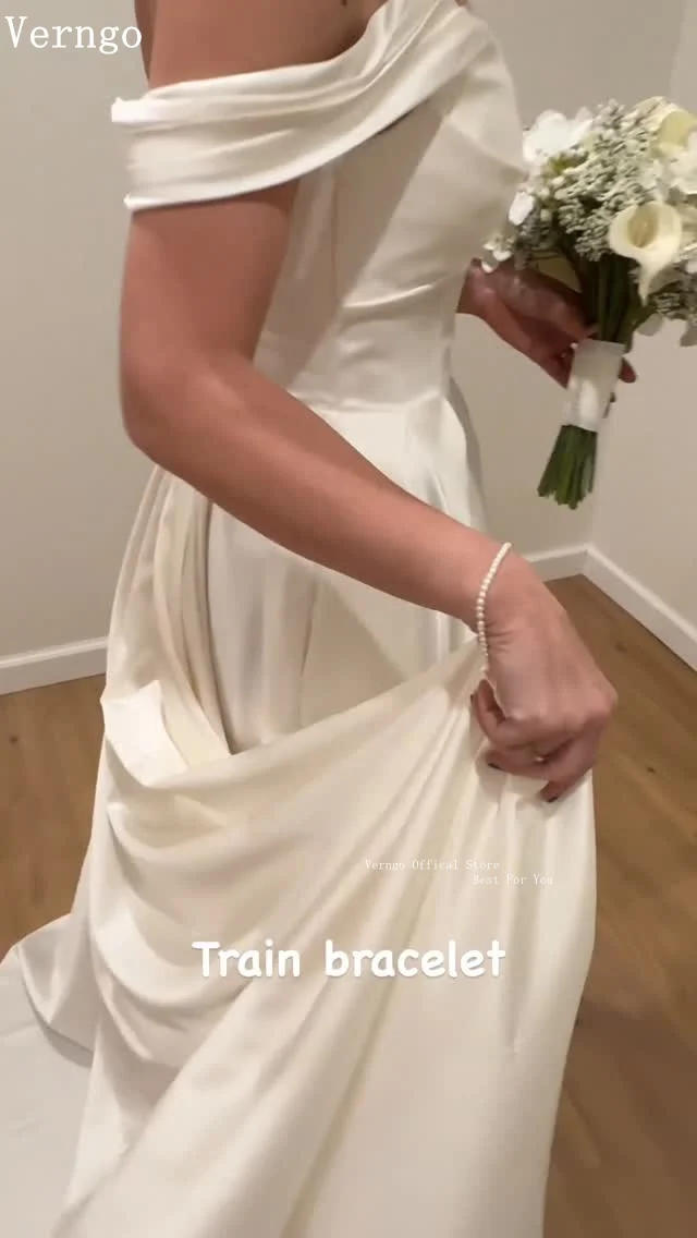 Verngo 2026 Off Shoulder Satin Wedding Dress Bracelet A Line Simple Bridal Gown Detachable Wrist Loop Bride Dresses Customized
Verngo 2026 Off Shoulder Satin Wedding Dress Bracelet A Line Simple Bridal Gown Detachable Wrist Loop Bride Dresses Customized