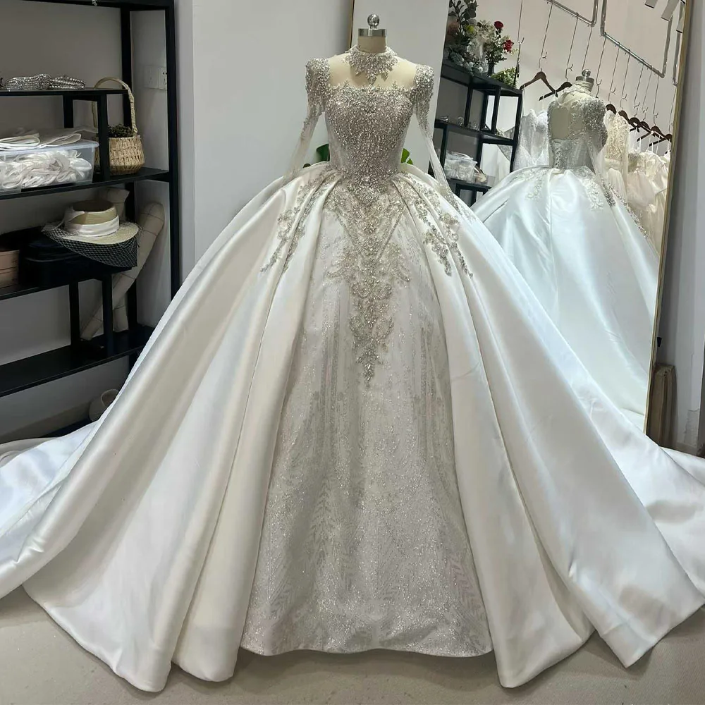 Vestidos 2026 Tendencias O Neck Lace Up Back Crystal Elegant Long Sleeves Wedding Dress For Brides
Vestidos 2026 Tendencias O Neck Lace Up Back Crystal Elegant Long Sleeves Wedding Dress For Brides
