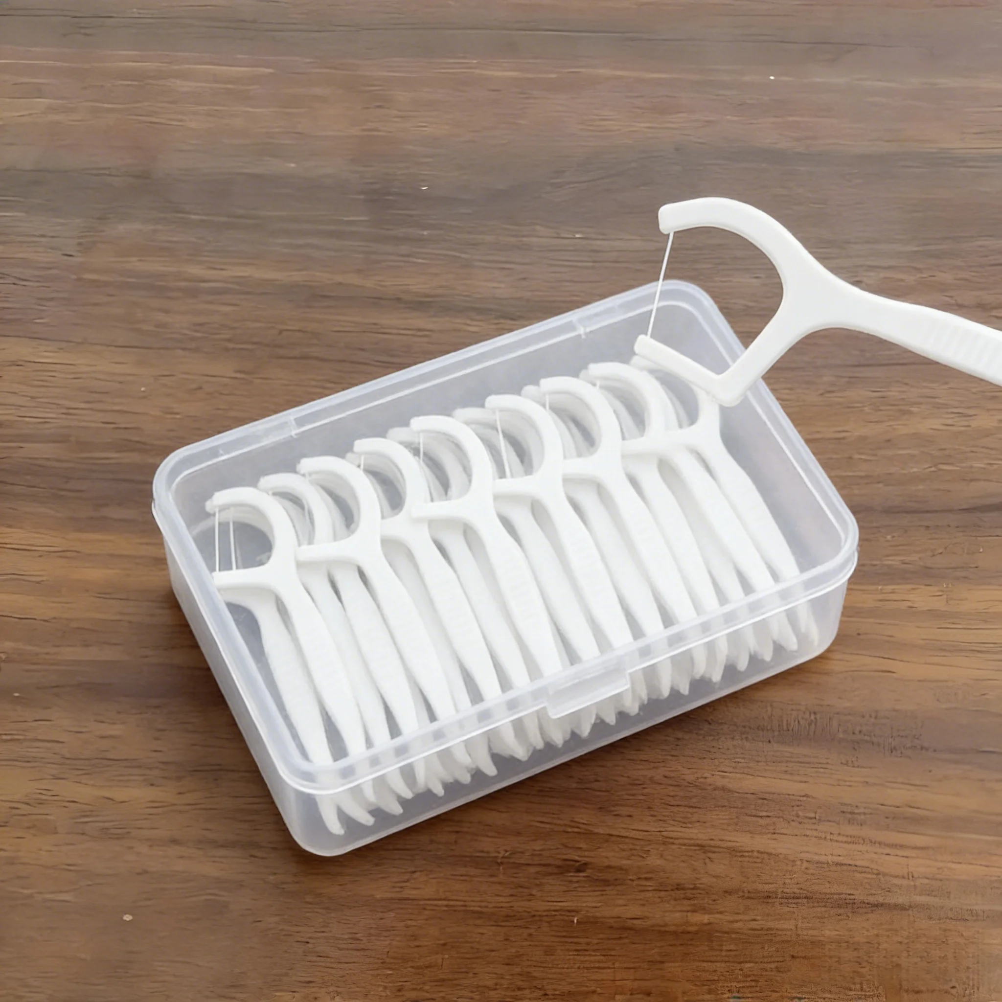 Портативная упаковка пятидесят зубных нитей, предназначенная для ухода за полостью рта и общего использования в семье.
Портативная упаковка пятидесят зубных нитей, предназначенная для ухода за полостью рта и общего использования в семье.