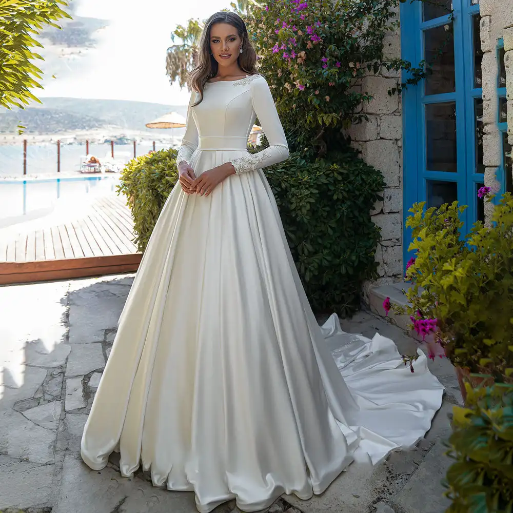 Satin Wedding Dress 2025 3D Flowers Beaded A-Line Mordern Long Sleeve Bridal Dress Sweep Train Button Wedding Gown Customized
Satin Wedding Dress 2025 3D Flowers Beaded A-Line Mordern Long Sleeve Bridal Dress Sweep Train Button Wedding Gown Customized