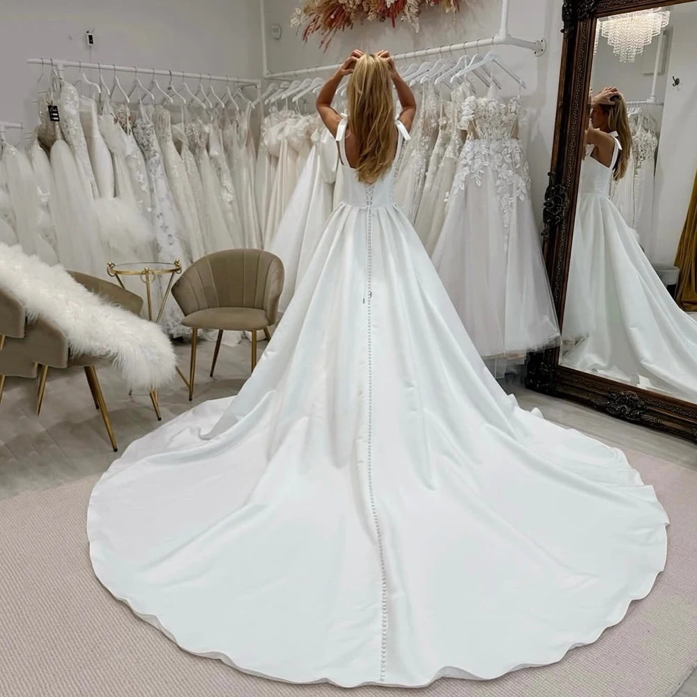 Msikoods Customized Satin Wedding Dress 2026 Bow Strap Luxury Bridal Dress Buttons Backless Wedding Gown Long Bridal Dress
Msikoods Customized Satin Wedding Dress 2026 Bow Strap Luxury Bridal Dress Buttons Backless Wedding Gown Long Bridal Dress