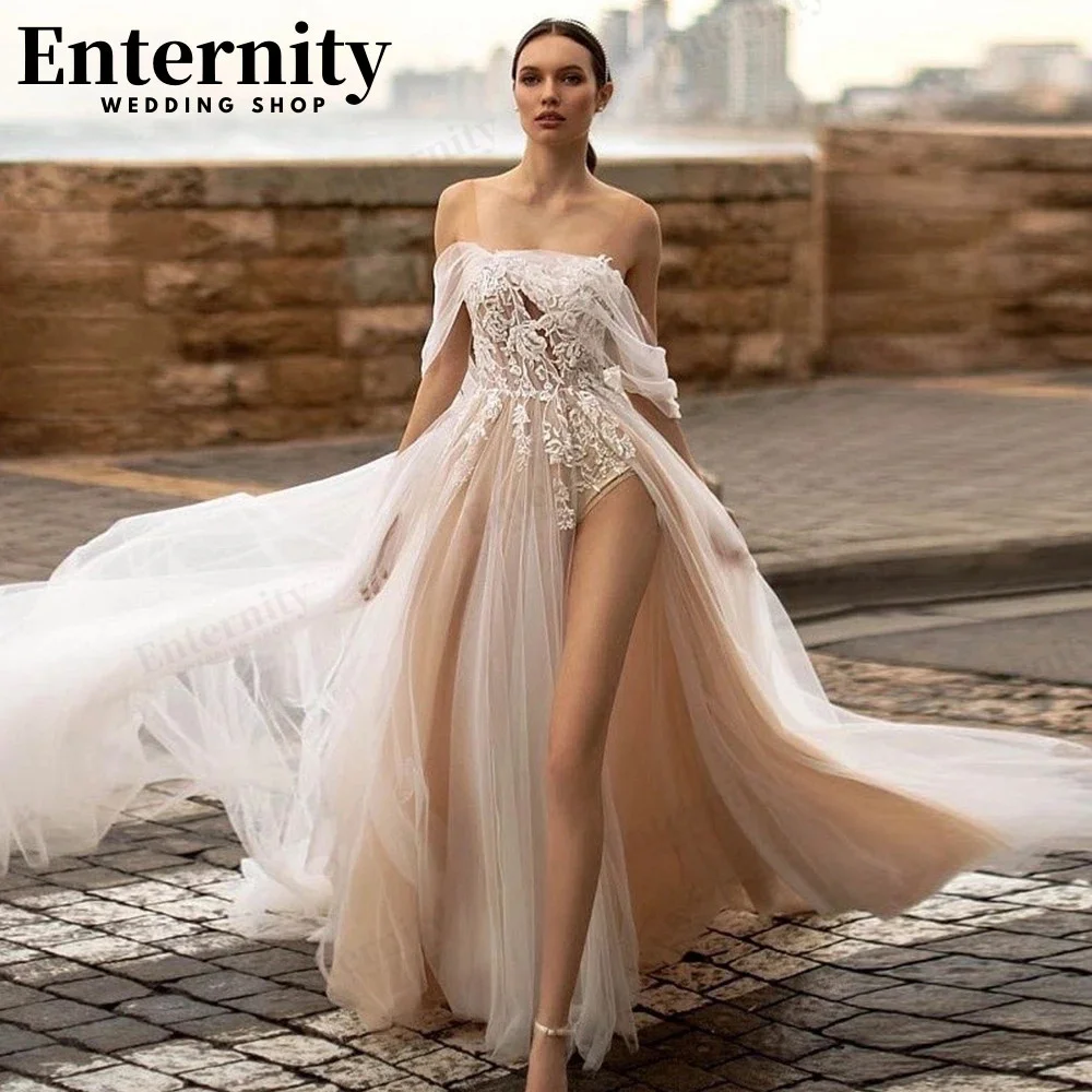 Captivating Side Split Wedding Dresses 2024 A-Line Lace Appliques Sweep Train Backless Champagne Strapless Boho Bridal Gowns
Captivating Side Split Wedding Dresses 2024 A-Line Lace Appliques Sweep Train Backless Champagne Strapless Boho Bridal Gowns