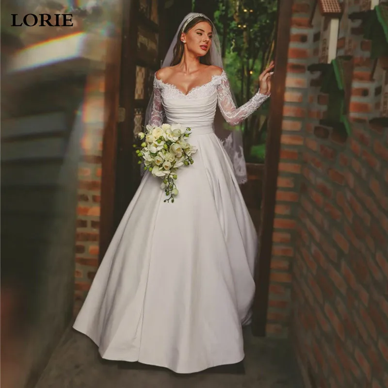 LORIE кружевное свадебное платье с длинным рукавом трапециевидной формы с открытыми плечами элегантные плиссированные платья невесты с бантом женское свадебное платье
LORIE кружевное свадебное платье с длинным рукавом трапециевидной формы с открытыми плечами элегантные плиссированные платья невесты с бантом женское свадебное платье