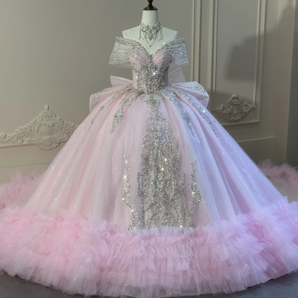 Pink Luxury Quinceanera Dress On Sale Bow Ruffles Crystal Off The Shoulder Vestido De XV Quinceañera
Pink Luxury Quinceanera Dress On Sale Bow Ruffles Crystal Off The Shoulder Vestido De XV Quinceañera
