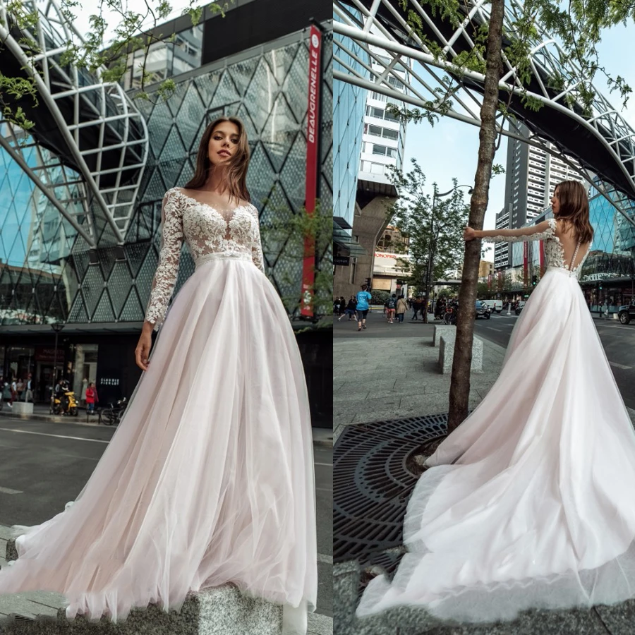 Long Sleeve O Neck Wedding Dress Lace Appliques Wedding Gowns Button Back Bridal Dresses Tulle vestido de noiva Floor Length
Long Sleeve O Neck Wedding Dress Lace Appliques Wedding Gowns Button Back Bridal Dresses Tulle vestido de noiva Floor Length