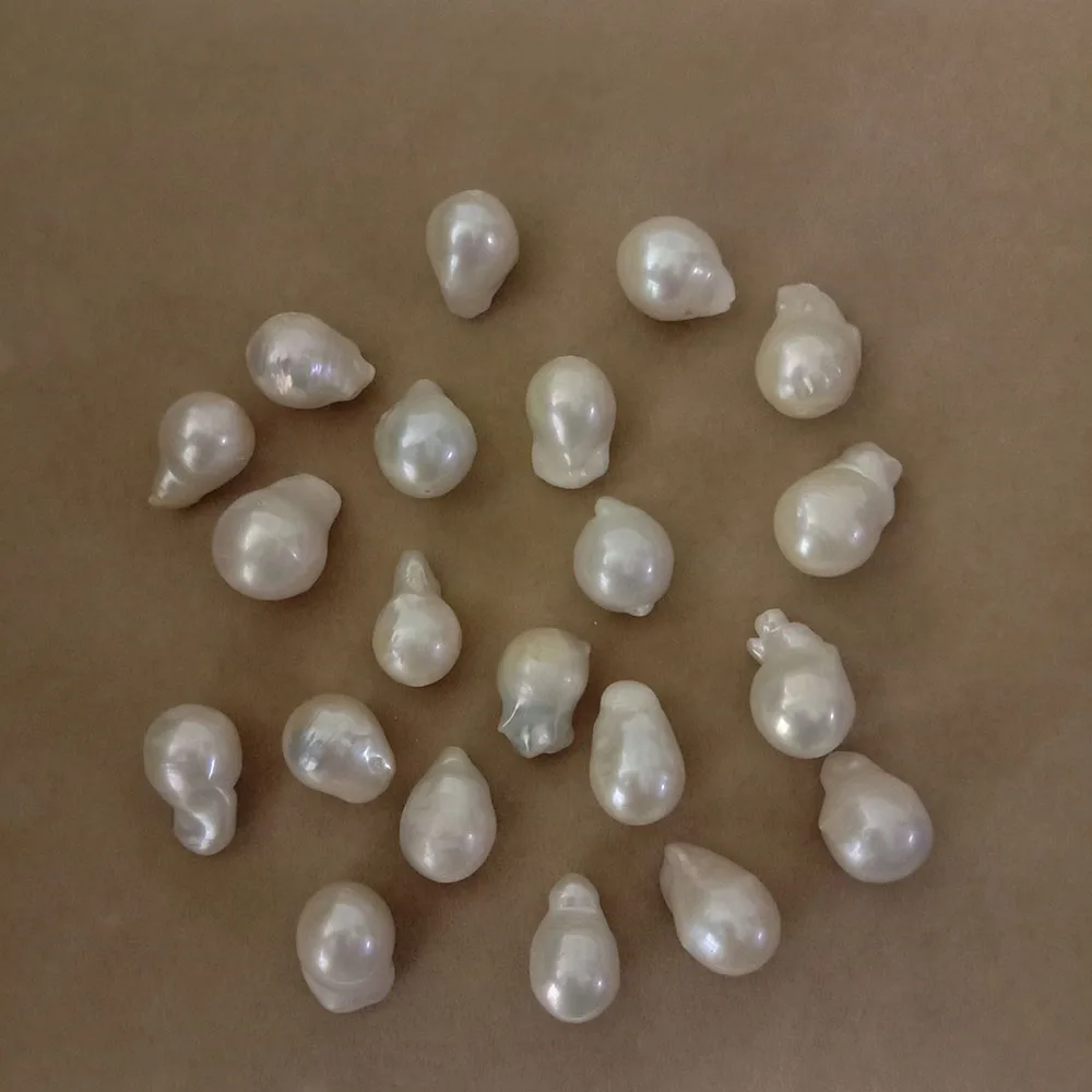 5 pcS/LOT FREE SHIPPING,good luster Nature freshwater loose pearl with baroque shape,full hole drilled,W12-14mm LENGTH:16-22 mm
5 pcS/LOT FREE SHIPPING,good luster Nature freshwater loose pearl with baroque shape,full hole drilled,W12-14mm LENGTH:16-22 mm