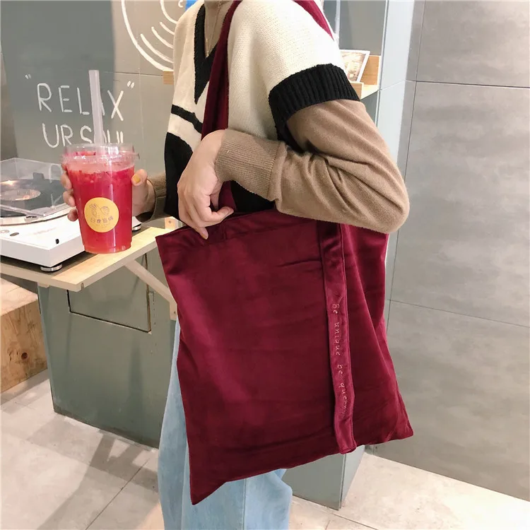 Red velvet canvas bag embroidered letter streamer canvas tote bag ins retro chic embroidery shopping bag with ribbon
Red velvet canvas bag embroidered letter streamer canvas tote bag ins retro chic embroidery shopping bag with ribbon