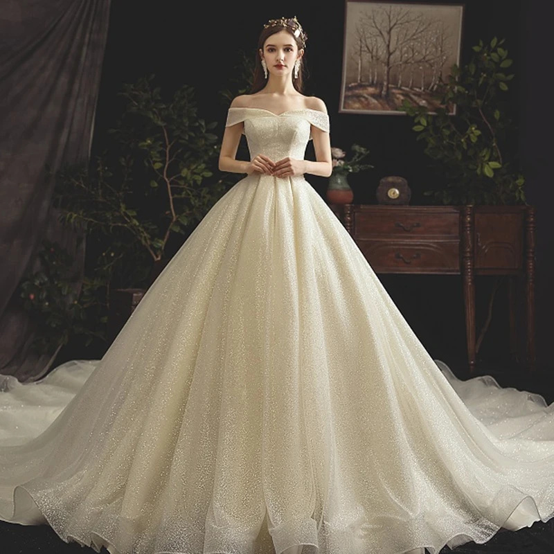 Luxury Shining A Line Wedding Dresses Satin Sequined Lace Boat Neck Floor Length Bridal Gown Chapel Train Corset Back
Luxury Shining A Line Wedding Dresses Satin Sequined Lace Boat Neck Floor Length Bridal Gown Chapel Train Corset Back