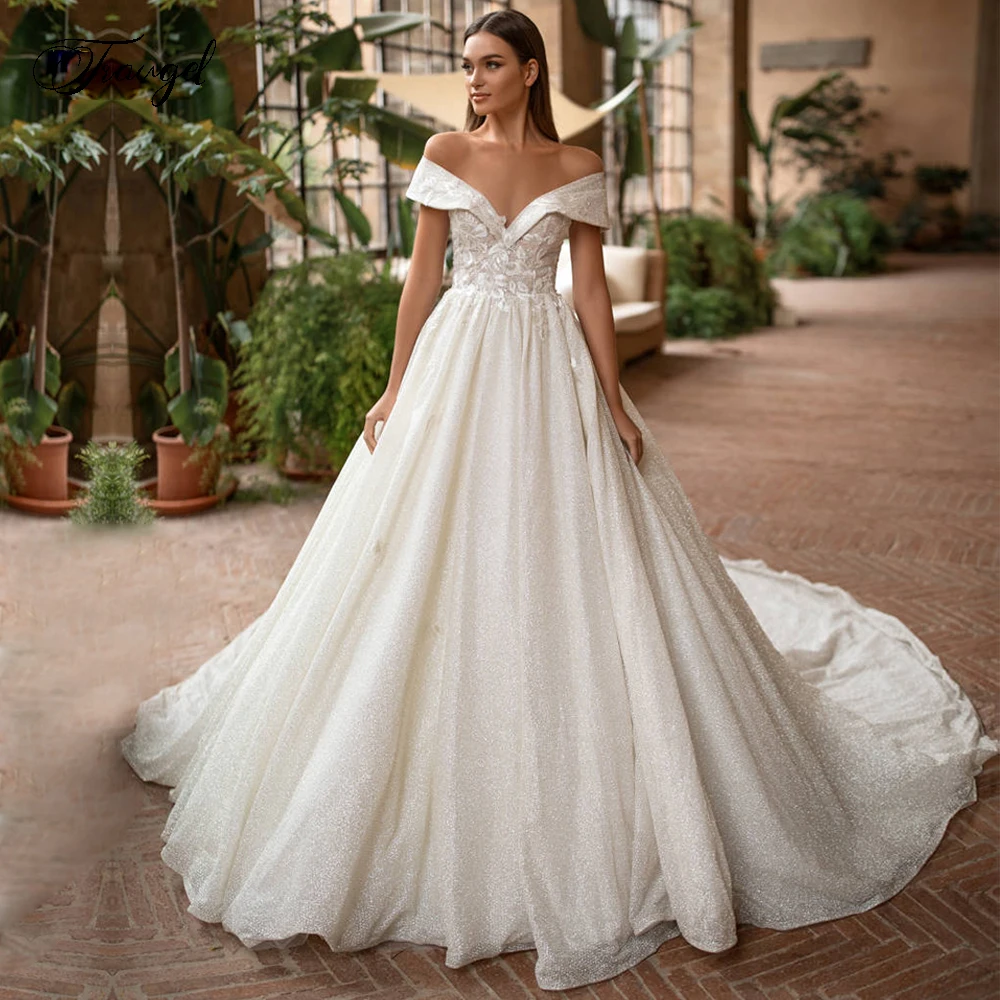 Traugel Illusion Scoop A Line Lace Wedding Dresses Glitter Applique Off The Shoulder Zipper Bride Dress Chapel Train Bridal Gown
Traugel Illusion Scoop A Line Lace Wedding Dresses Glitter Applique Off The Shoulder Zipper Bride Dress Chapel Train Bridal Gown