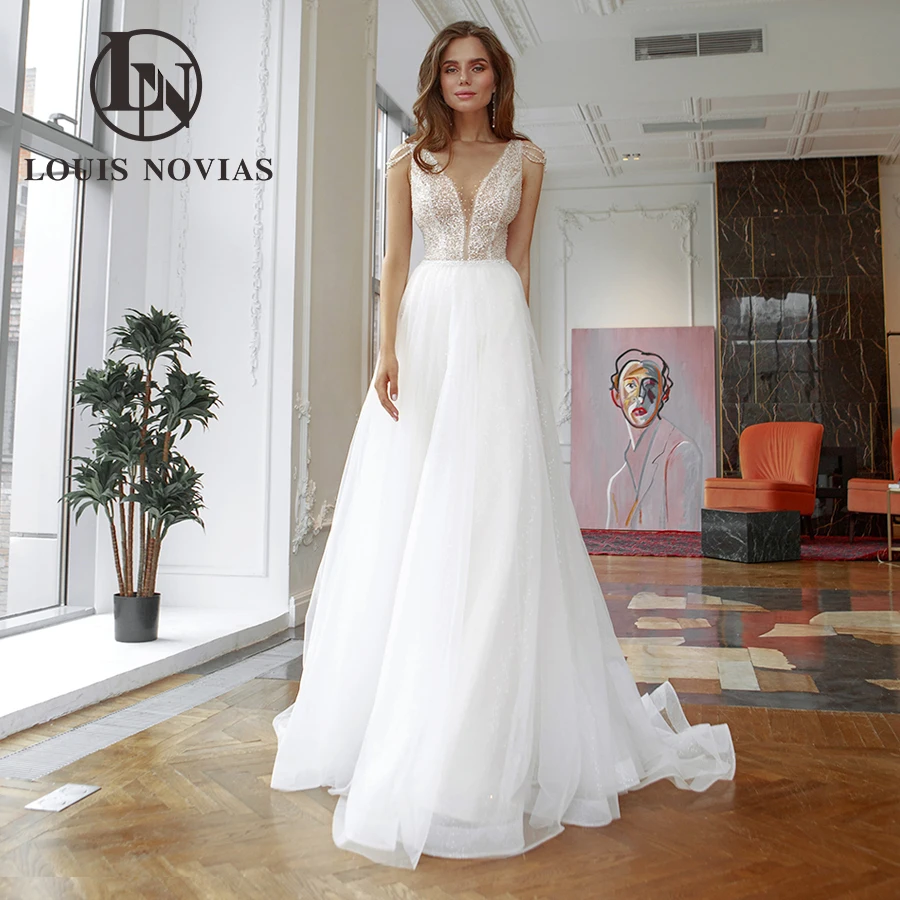 LOUIS NOVIAS A-Line Wedding Dresses For Women Sexy BOHO Sequined Sleeveless Bridal Gown Illusion Deep V-Neck Vestido De Novia
LOUIS NOVIAS A-Line Wedding Dresses For Women Sexy BOHO Sequined Sleeveless Bridal Gown Illusion Deep V-Neck Vestido De Novia