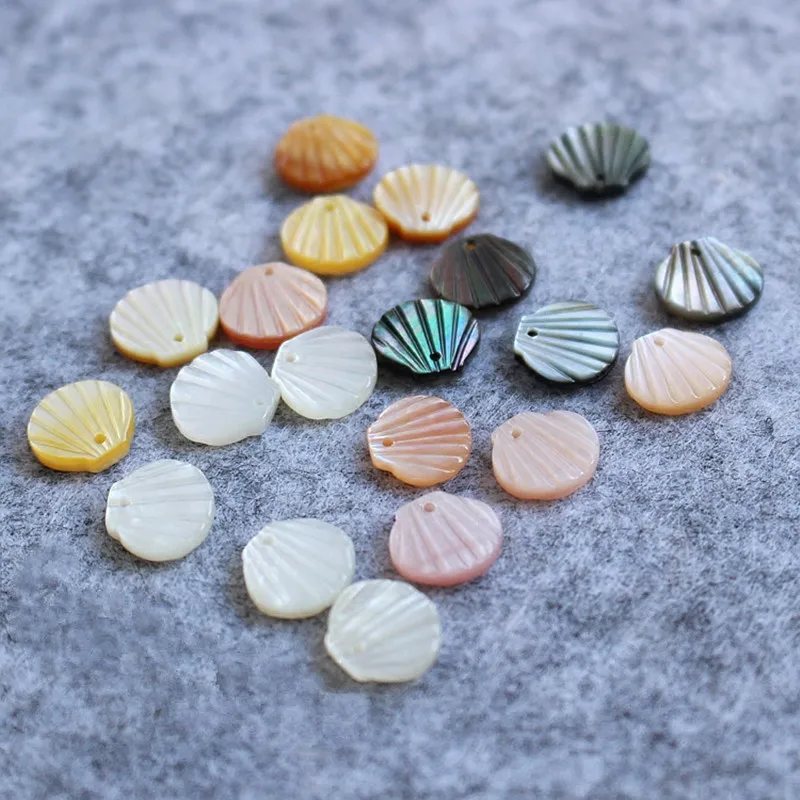 10Pcs/Lot 10x11MM Natural Seashell Beads Scallop Shape Yellow Pink Shell Beads For DIY Earrings Necklaces Charm Jewelry Pendants
10Pcs/Lot 10x11MM Natural Seashell Beads Scallop Shape Yellow Pink Shell Beads For DIY Earrings Necklaces Charm Jewelry Pendants