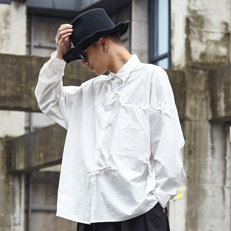 Men's spring and autumn new singer hair stylist black and white two color casual loose large size long sleeve shirt
Men's spring and autumn new singer hair stylist black and white two color casual loose large size long sleeve shirt