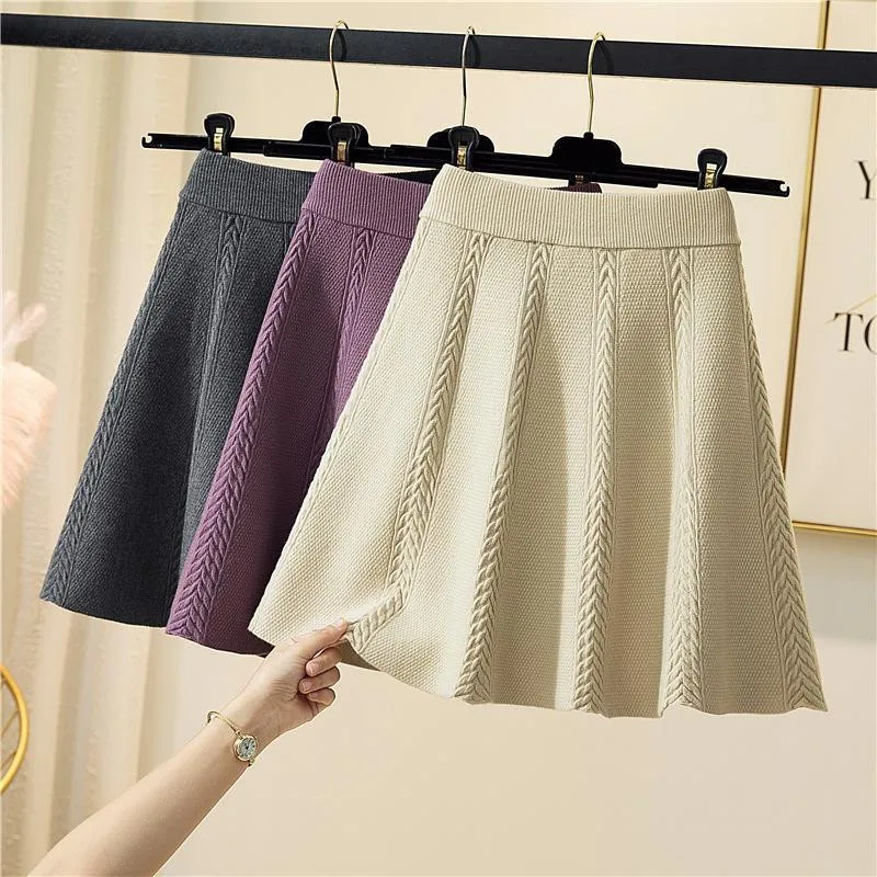 Women Skirt Autumn Winter Knitted Short Skirt A-Line High Waist Pleated Mini Skirt Black Purple mujer faldas 2020
Women Skirt Autumn Winter Knitted Short Skirt A-Line High Waist Pleated Mini Skirt Black Purple mujer faldas 2020